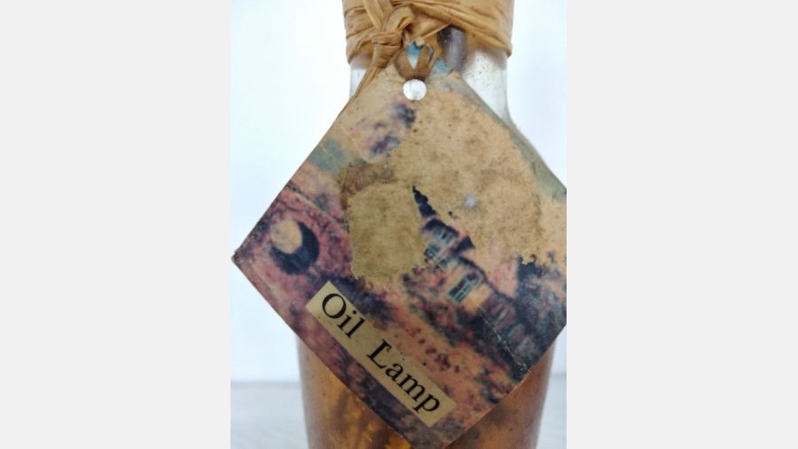 Candeeiro a óleo em garrafa